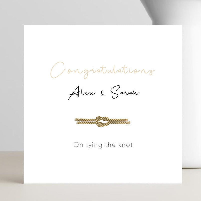 Illustrated tying the knot wedding card personalised with the bride and groom’s names for a unique keepsake.