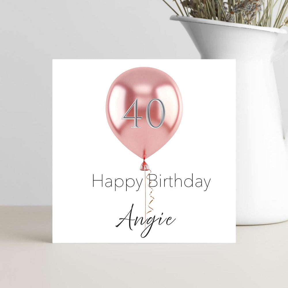40th birthday card for her from friends with personalised pink balloon design, cheerful and celebratory.