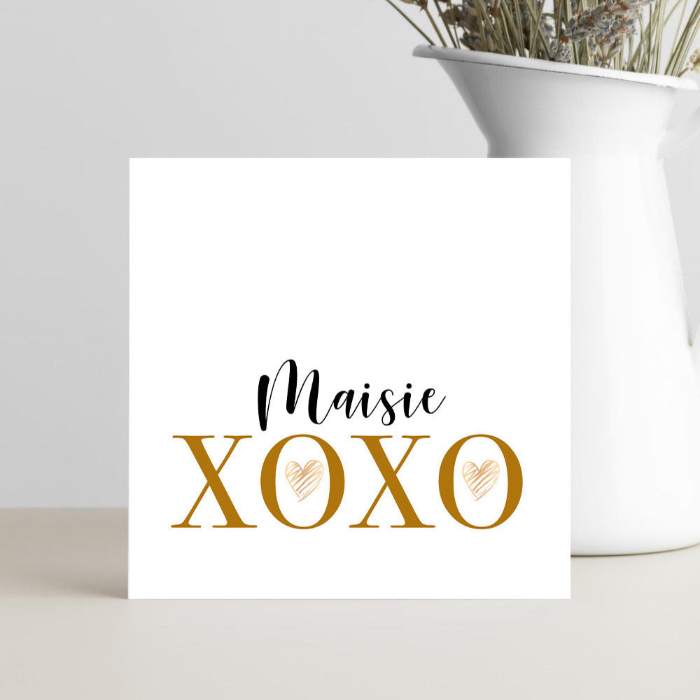 Personalised Maisie XOXO greeting card with gold lettering and heart design