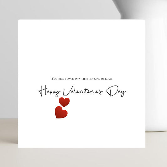 Unisex Valentine’s Day card with the message “You’re my once in a lifetime kind of love, Happy Valentine’s Day” displayed in elegant romantic typography.