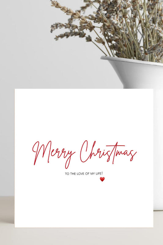 Christmas card with 'Merry Christmas to the love of my life' text and a heart symbol.