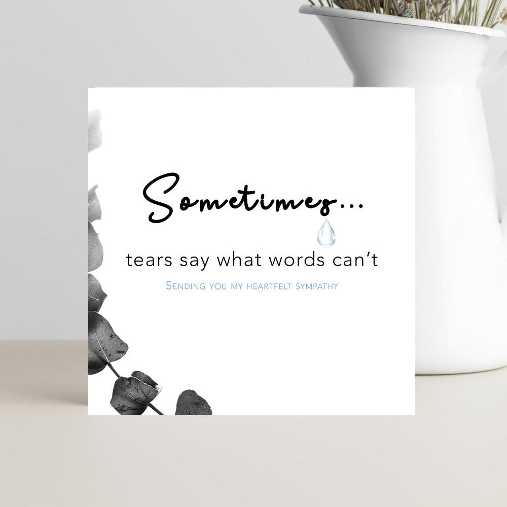 Minimalist sympathy card with the message "Sometimes, tears say what words can't. Sending you my heartfelt sympathy" for grief, condolences, bereavement, and support.