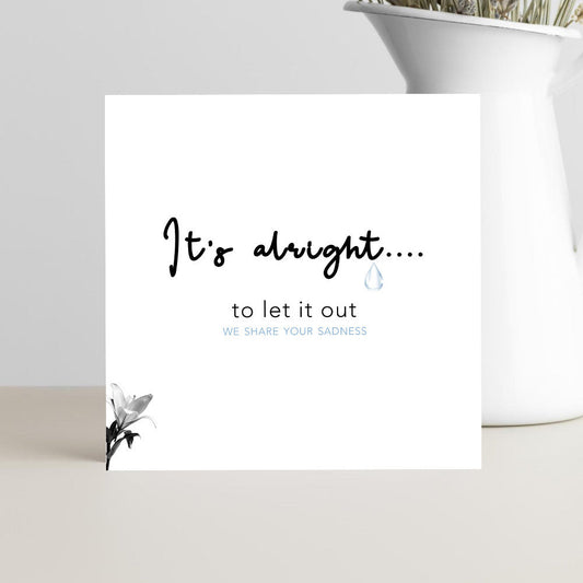Minimalist sympathy card featuring the message "It's alright to let it out. We share your sadness" for condolences, grief, bereavement, and support.