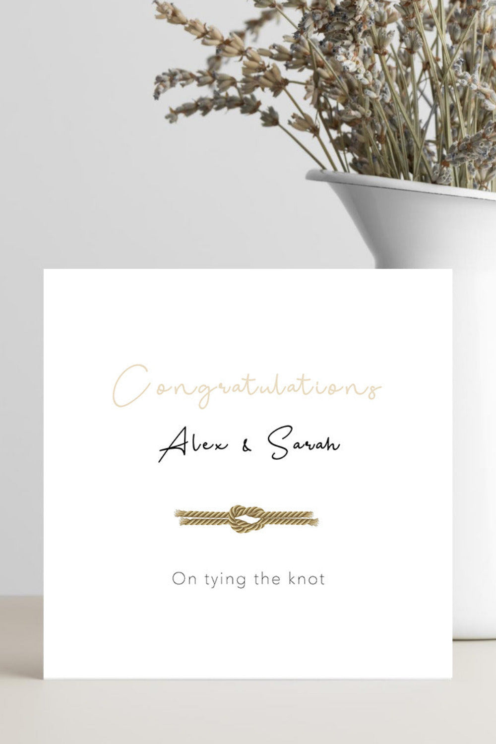 Illustrated tying the knot wedding card personalised with the bride and groom’s names for a unique keepsake.