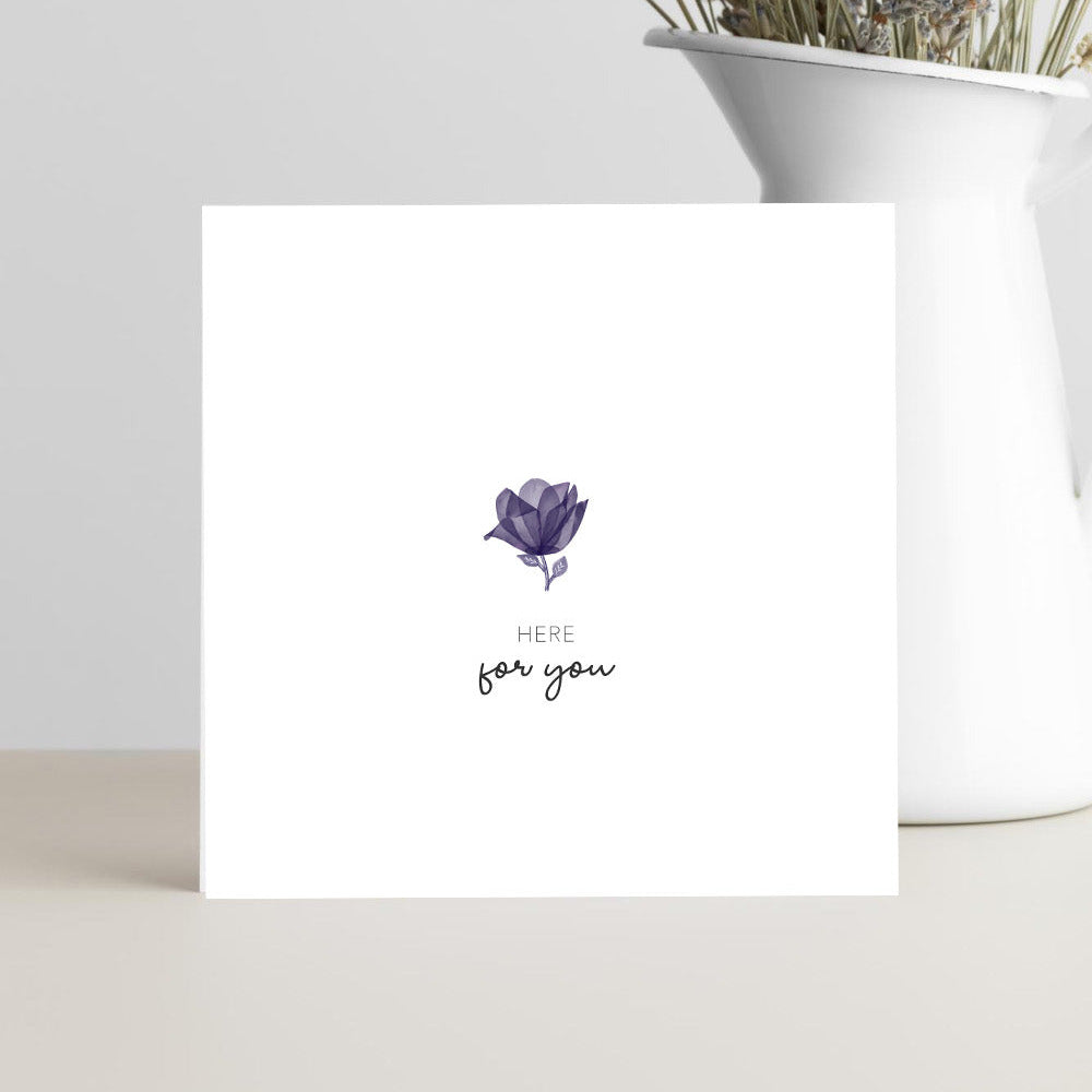 Card with a purple flower illustration and 'Here for you' text