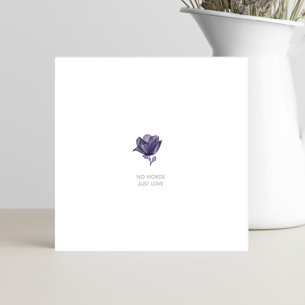 Minimalist sympathy card featuring a single blue flower on a clean white background