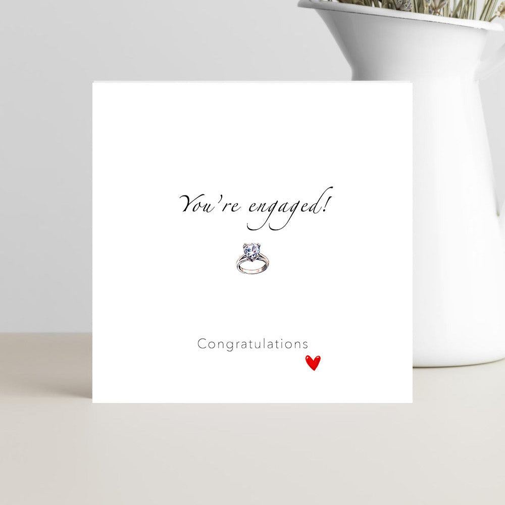 Minimalist engagement card with “You’re engaged, congratulations!” text