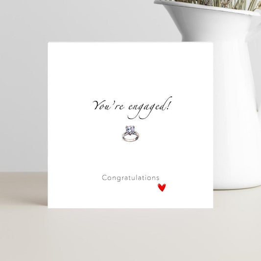 Minimalist engagement card with “You’re engaged, congratulations!” text