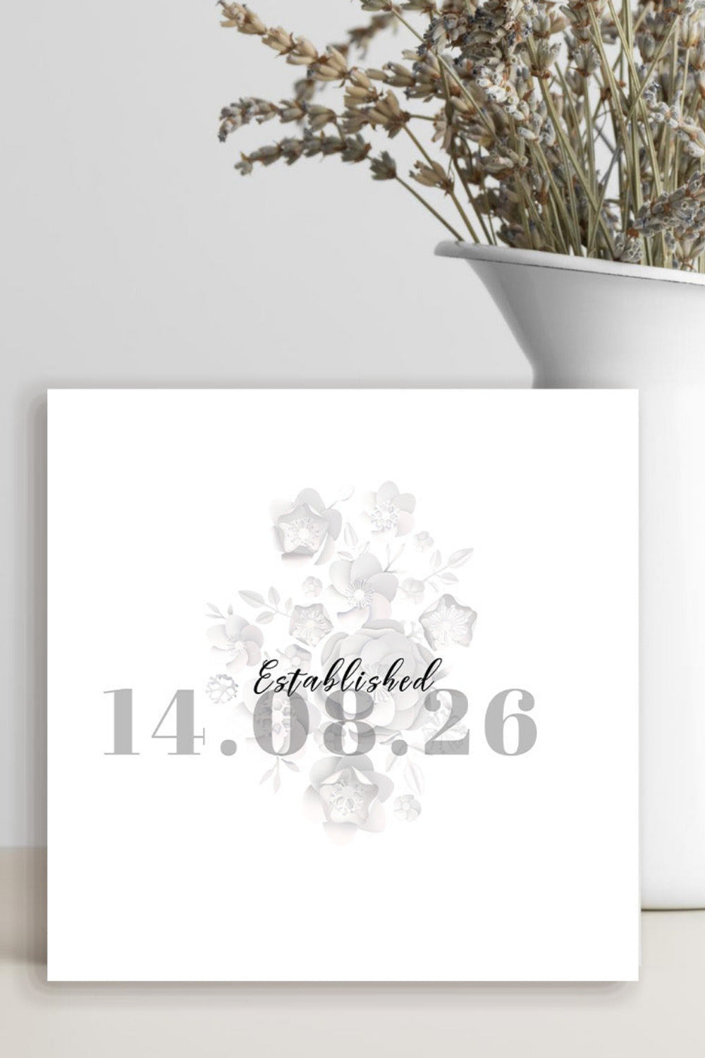 A square white personalized art print with a light gray floral design and the text 'Established 14.08.