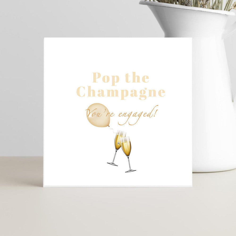 Champagne congratulations engagement card with glasses and ring illustration