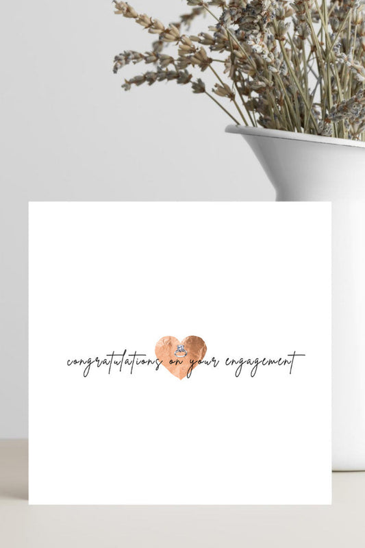 Greeting card with a ring illustration and 'Congratulations!' text on a white background.