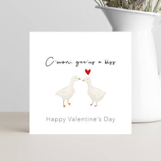 Funny Valentine’s Day card with the caption “Gee’us a kiss, happy Valentine’s Day”