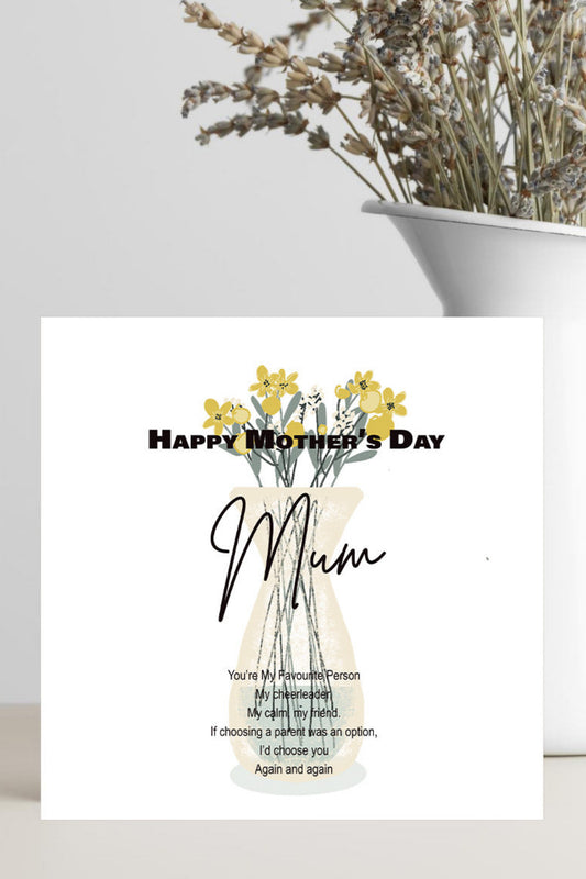 A square white Mother's Day greeting card with a floral design and the words 'Happy Mother's Day Mum' and a poem, styled in front of a white vase with dried flowers on a light surface.