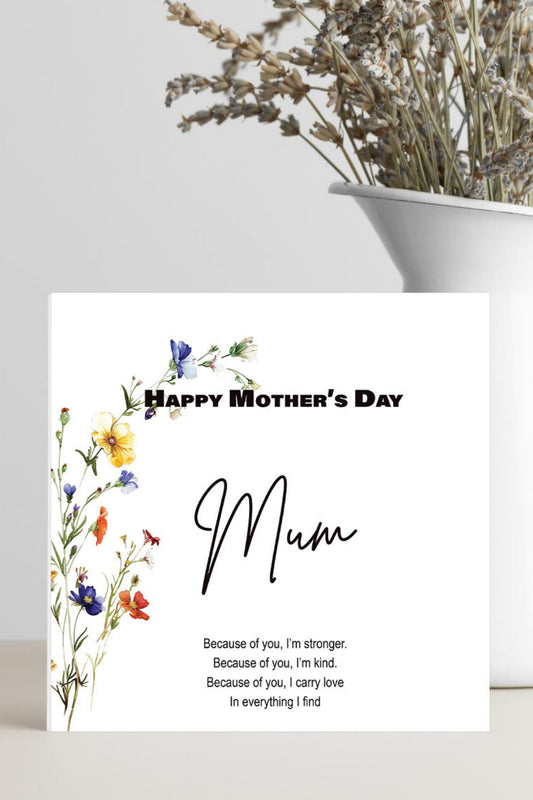 A square Mother's Day greeting card with floral illustrations and the text 'Happy Mother's Day Mum' and a short quote, styled in front of a white vase with dried flowers on a light surface.