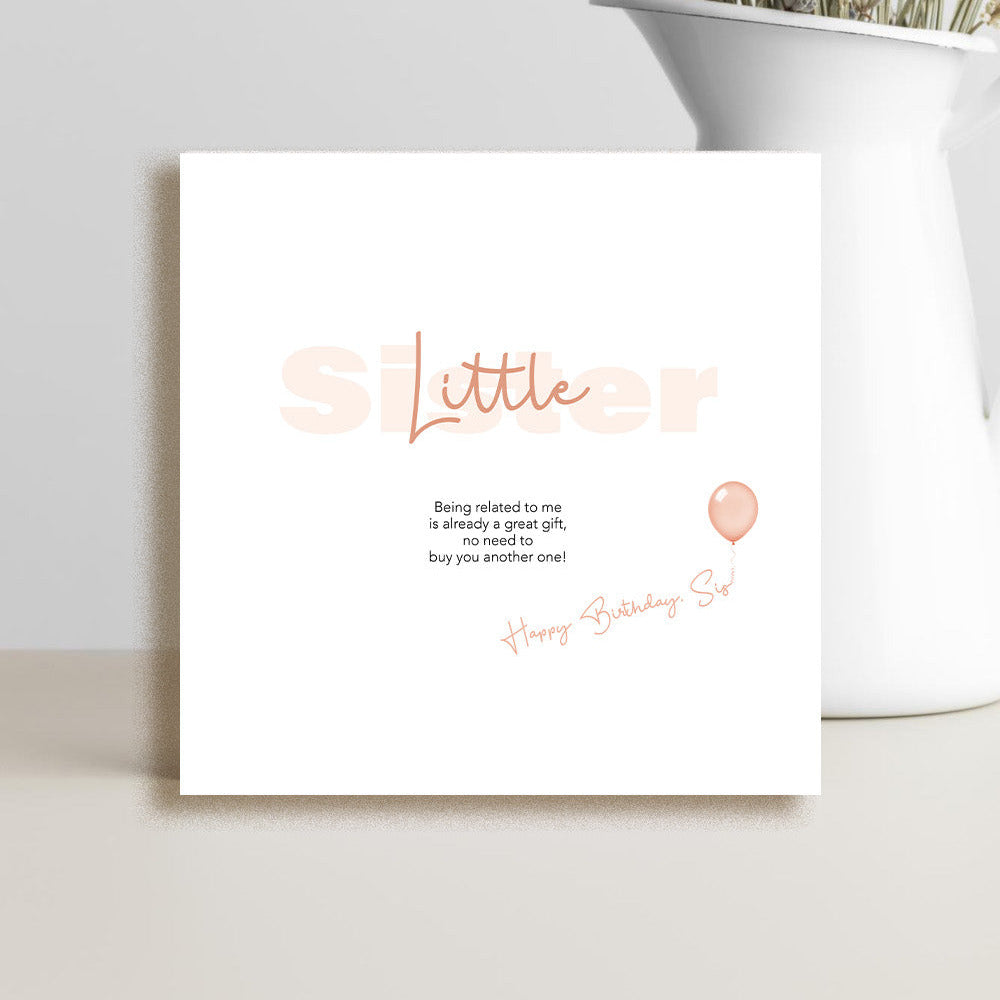 Funny sister birthday card featuring a cheeky message about being related being a great gift and not needing another present.