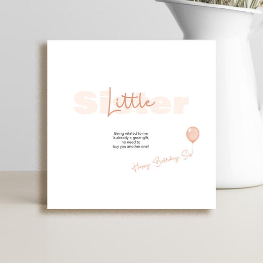 Funny sister birthday card featuring a cheeky message about being related being a great gift and not needing another present.