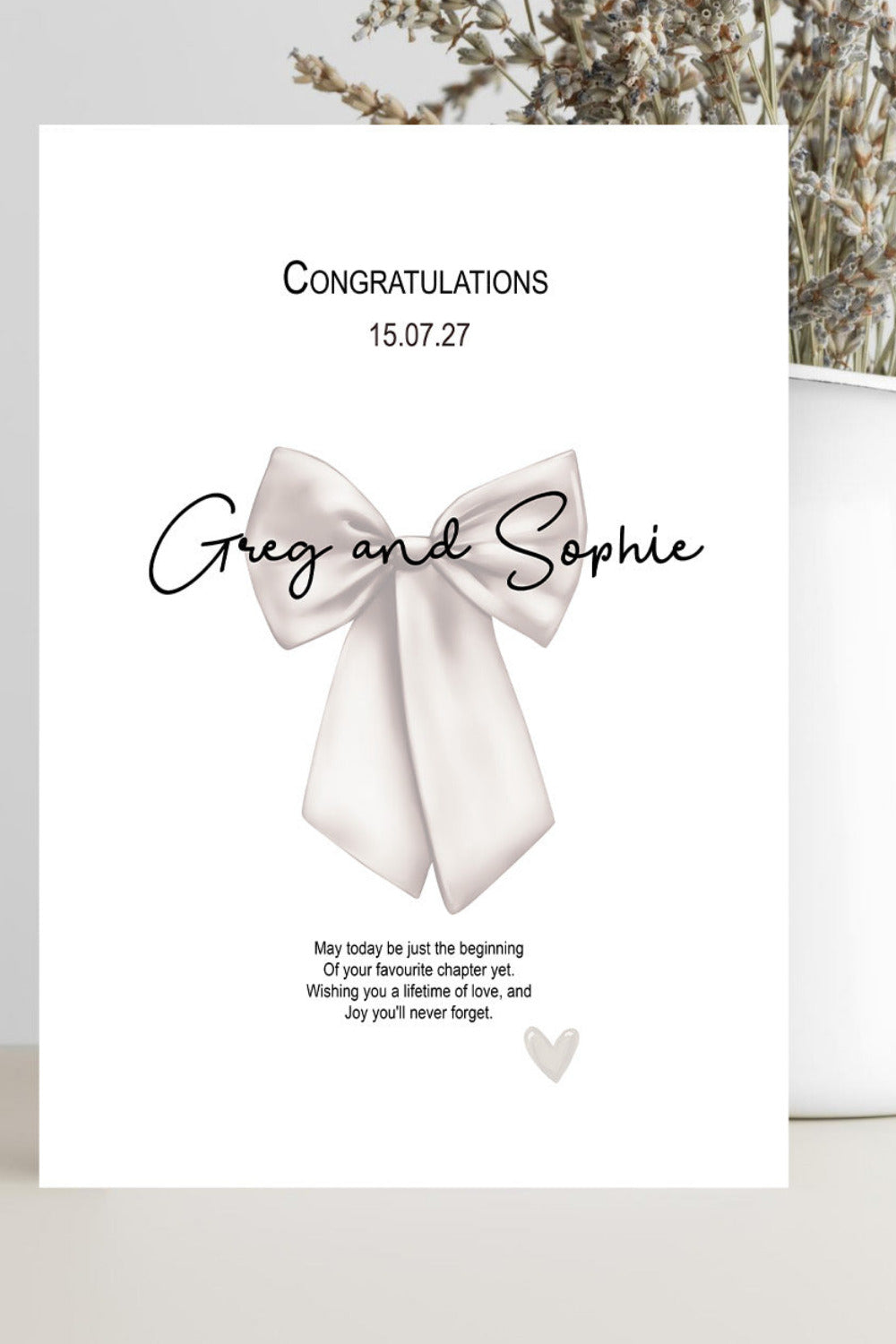 Wedding congratulations card featuring a meaningful message wishing the happy couple the beginning of their favourite chapter and a lifetime of love and joy.
