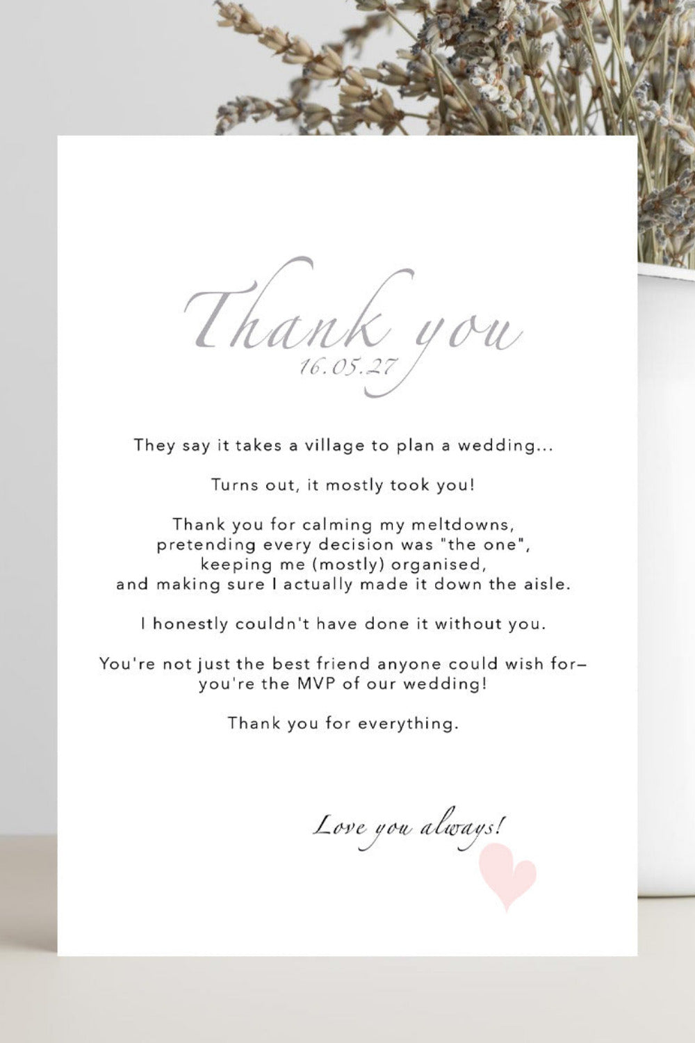 A white wedding thank you card with elegant gray script and black text