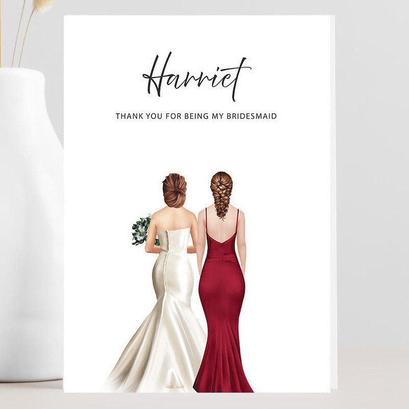 Greeting card with two women in formal dresses and text 'Harriet, Thank you for being my bridesmaid' on a white background.