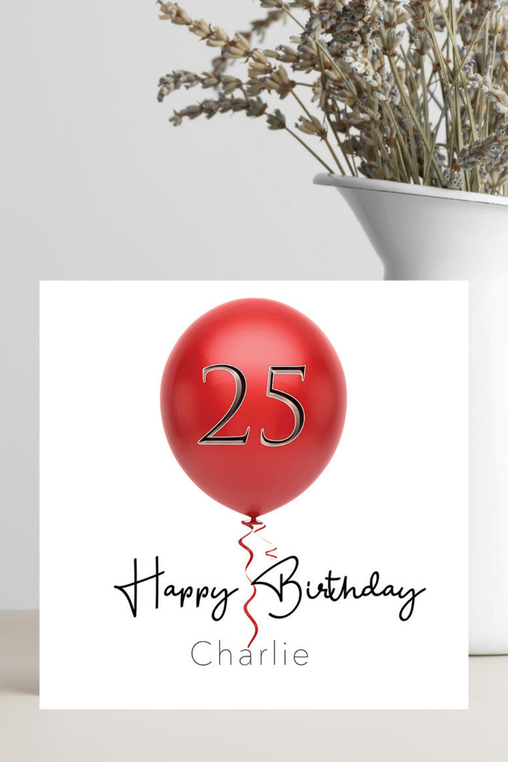 Handmade personalised birthday card featuring a bright red balloon with the number 25 and a custom name, with option to change age.
