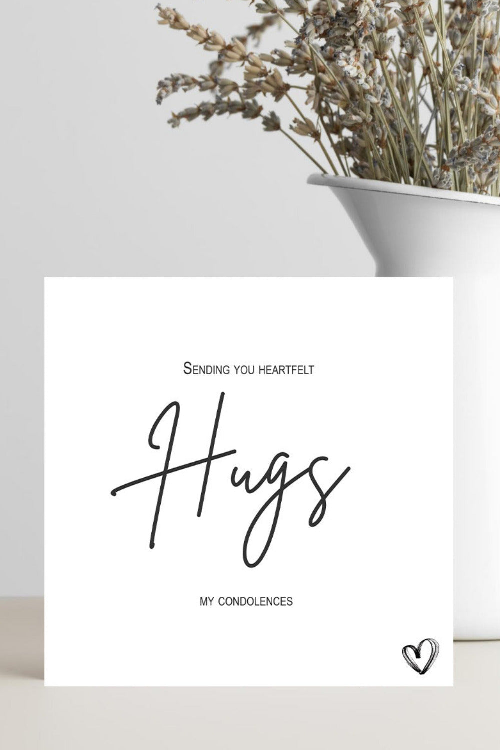 Square card with a heartfelt message of condolence.  Sending you hugs.