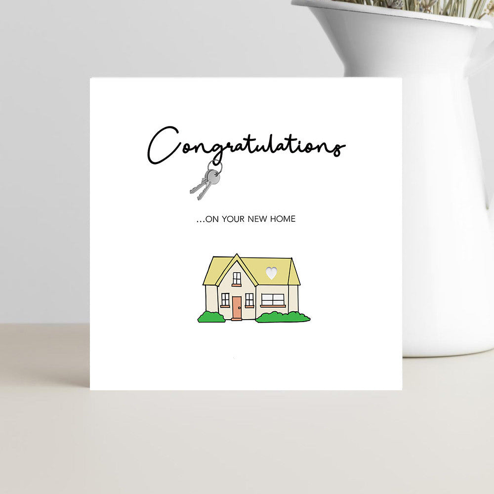 Playful new home congratulations card design featuring house keys for new homeowners