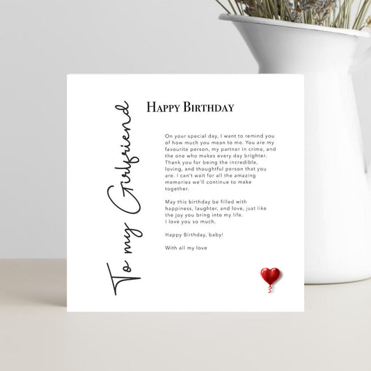 To my girlfriend, love note birthday card with small red heart.