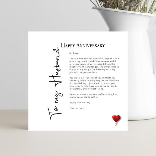Square Anniversary card for a husband.  Five verses of why you love him.  Plain black and white card finished off with a red heart balloon.