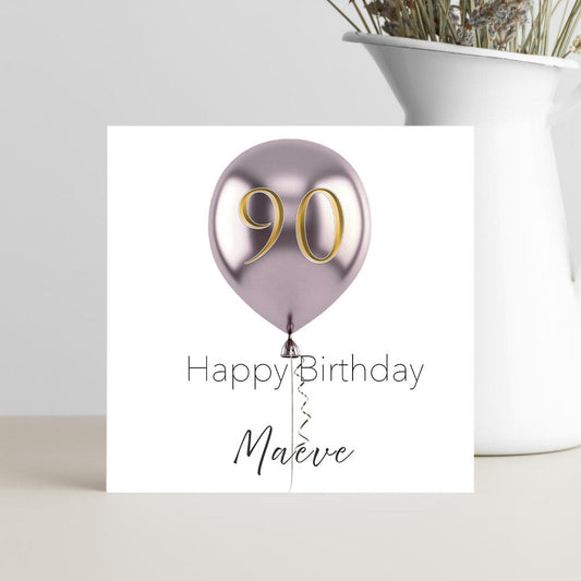 Handmade 90th birthday greeting card featuring a single balloon with the number 90 and a personalised name on the front.