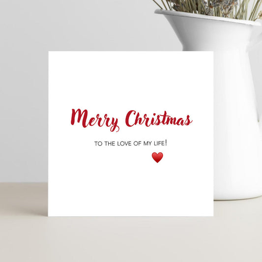 Christmas card with 'Merry Christmas to the love of my life' text and a heart symbol.
