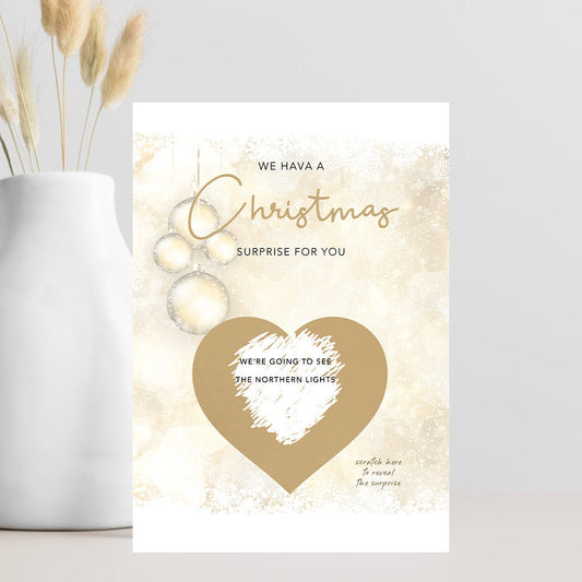 Christmas scratch card with gold text and heart design